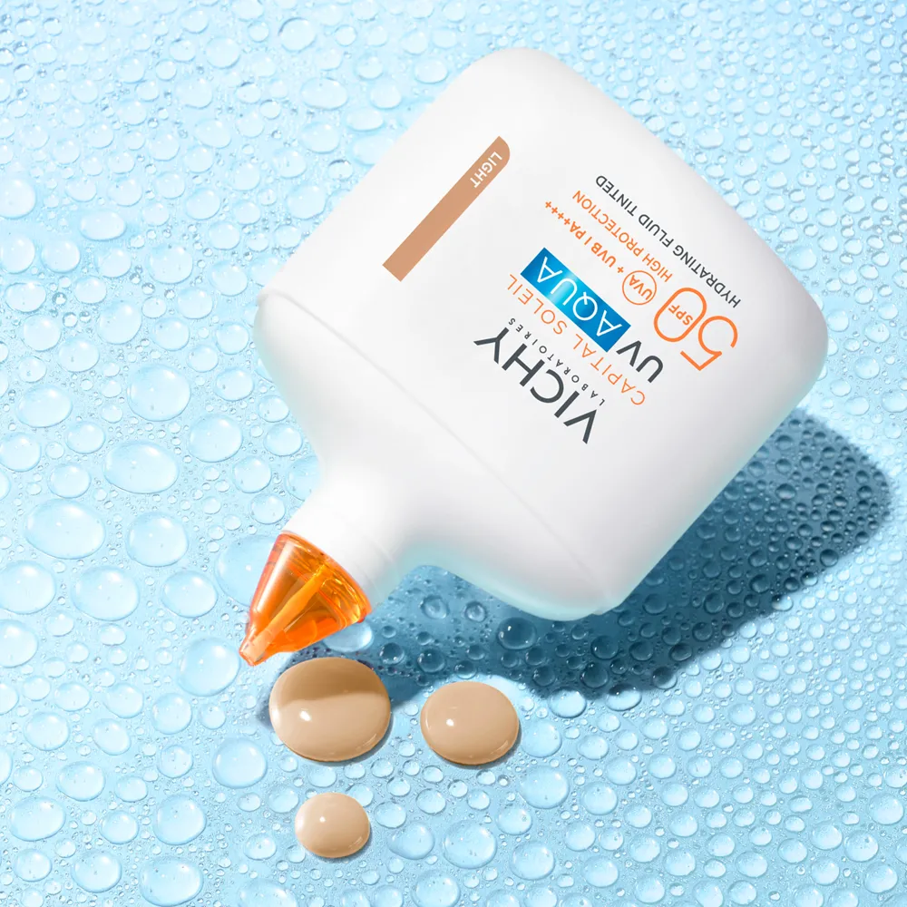 Fluid hidratant colorat cu protectie solara SPF 50 Nuanta Light Capital Soleil UV Aqua, 50 ml, Vichy