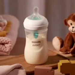 Set Biberoane Natural Response 2 x 125ml + 2 x 250ml + Suzeta + Perie 657/11, Avent Philips